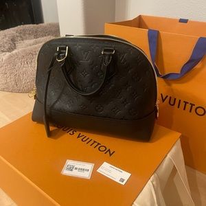 Authentic Louis Vuitton black Neo Alma PM